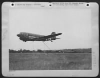 In a flower covered field in France a CG-4 Glider stood ready for the first snap take-off since D-Day on foreign territory. The take-off was successful under the supervision of Col. Glynne M. Jones, of 9th Troop Carrier Command. - Page 1