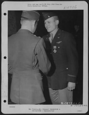 Unidentified > Major General Samuel E. Anderson Presents The Distinguished Flying Cross To An Officer Of The 410Th Bomb Group During A Ceremony At An Airbase Somewhere In France.