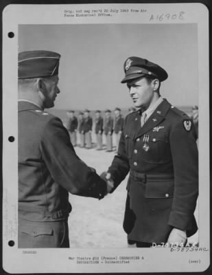 Unidentified > Major General Samuel E. Anderson Presents The Distinguished Flying Cross To An Officer Of The 410Th Bomb Group During A Ceremony At An Airbase Somewhere In France.