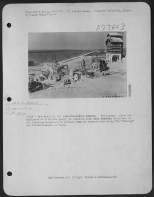 Consolidated > ITALY-The basis of all rock-foundation runways-the quarry. Here the equipment of a native quarry is combined with rock crushing equipment of the aviation engineers to produce tons of crushed rock daily for "footing" for Allied bombers in Italy.