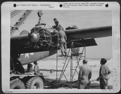 Thumbnail for Consolidated > Within sight of the Italian battle-lines, Air Service Command Technicians came to the rescue of a crashed Consolidated B-24 Liberator bomber recently. In 12 days they had made complete repairs and even constructed a landing strip for the plane's