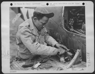 Consolidated > THOSE P-39 AIRACOBRAS-being used by a Negro fighter group operating with the Mediterranean Allied Air Forces msut be kept in good condition mechanically. That's where S/Sgt. James McGee, of Marianna, Ark., comes in for his offering. He has served