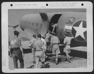 Thumbnail for Consolidated > Wounded are evacuated by troop carrier planes of the NAAF from Italy.