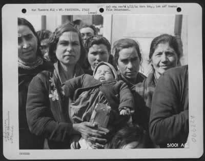 Thumbnail for Consolidated > Some of the Italian families who fled the advancing lava flow during the eruption of Mt. Vesuvius.