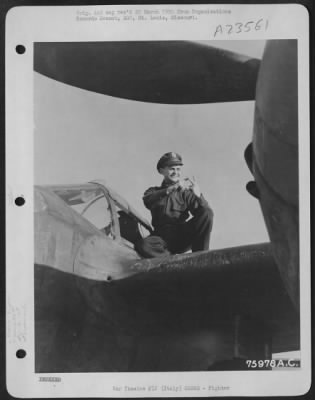 Thumbnail for Consolidated > Lt Mectintosh Of The 94Th Fighter Squadron, 1St Fighter Group, Seated On The Wing Of His Lockheed P-38 Lightning At An Airfield Somewhere In Italy.