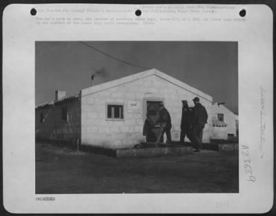 Consolidated > The Day'S Work Is Done, And Instead Of Avoiding Their Tent, These Gi'S At A 15Th Af Base Return To The Comfort Of The House They Built Themselves.  Italy.