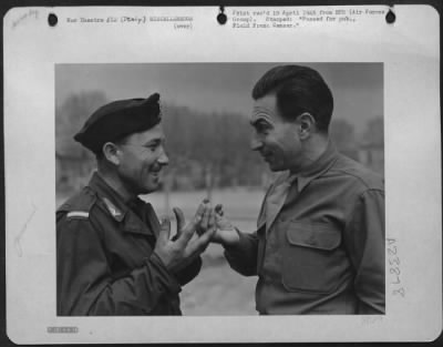 Consolidated > Sgt. Eddie Cope Of Austin, Texas, Tries Out The Italian Sign Language On Gi Guiseppe.  Success!  Italy.