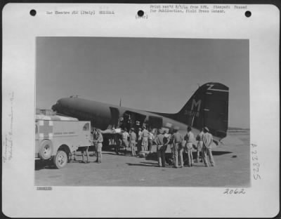 Thumbnail for Consolidated > Wounded British And Indian Soliders Are Being Placed On A Dakota Aircraft By Raf And British Army Medical Orderlies At A Forward Airfield In Italy, For Evacuation To Base Hospitals.