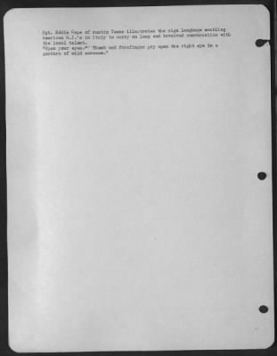 Consolidated > Sgt. Eddie Cope Of Austin Texas Illustrates The Sign Language Enabling American G.I.'S In Italy To Carry On Long And Involved Conversation With The Local Talent.  'Open Your Eyes' - Thumb And Forefinger Pry Open The Right Eye In A Gesture Of Mild Sarcasm.