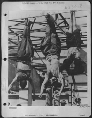 Consolidated > Left To Right: Achillf Starace, One-Time Secretary Of The Fascist Party, Mussolini, And Claretta Petacci, Mussolini'S Mistress, Hanging From A Filling Station Front In The Center Of Milan After They Were Shot By Italian Patriots.  Italy.