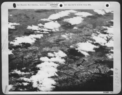 Consolidated > Stricken Fortress Hurtles Berlin-ward . . . . With flames shooting out from its No 3 engine and right wing, a doomed Fortress of the 8th AF starts its fatal dive into the heart of Berlin, after being hit during the 6 March attack. Other photo shows