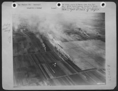 Consolidated > 4th Fighter Group attacking German aircraft on airdrome 30 miles west of Leipzig, Germany, on February 27, 1945. The Group, commanded by Col. Everett W. Stewart, 300 Rogers Ave., Abilene, Kansas, destroyed 41 aircraft, some of which are shown burning