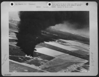 Consolidated > BURNING B-17 BEHIND LINES---Crash-landed behind the Allied lines, a U.S. Army 8th Air Force B-17 Flying Fortress lies burning in plain view of the men in the Western Front trenches. A cameraman in one of the 3rd Air Division bombers took this