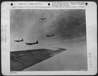 Consolidated > Flying Fortress of the 8th Air Force dropping sticks of 12 bombs each on bombing targets in Germany.