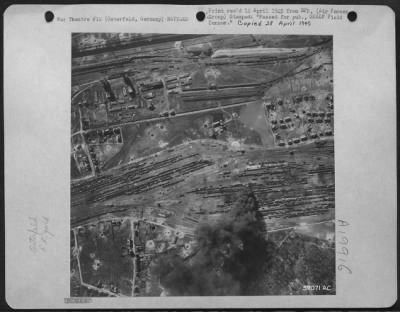 Consolidated > 1St Lt. Edward R. Johnston, Reynolds Ill., North American P-51 Mustang Pilot From A Tact. Reconnaissance Group Took This Shot Of The Osterfeld Railroad Yard Containing Nearly 1000 Mixed Cars And Six Locomotives.  Explosion And Large Oil Fire Were Caused B