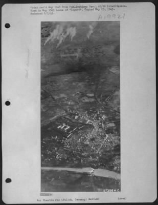 Consolidated > Smoking Under Us Artillery Fire, Nazi Town Of Julich, Germany Was Snapped From The Air On 25 Feb. 1945 As Our Troops Began Steamroller Drive Toward The Rhine.
