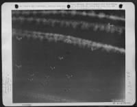 With A Background Of Feathery Vapor Trails Boeing B-17 Flying Fortresses Of The 452Nd Bomb Group Droned Steadily Over Germany Territory Enroute To Their Target, Gablingen, Germany.  16 March 1944.  8Th Air Force Attacks On Vital Nazi Installations Helped - Page 1