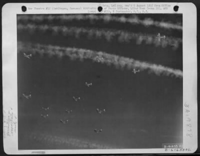 Consolidated > With A Background Of Feathery Vapor Trails Boeing B-17 Flying Fortresses Of The 452Nd Bomb Group Droned Steadily Over Germany Territory Enroute To Their Target, Gablingen, Germany.  16 March 1944.  8Th Air Force Attacks On Vital Nazi Installations Helped