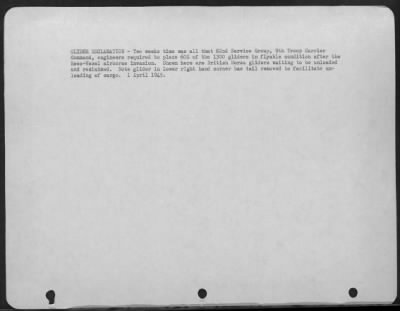 Consolidated > Glider Reclamation -- Two Weeks Time Was All That The 82Nd Service Group, 9Th Troop Carrier Command, Engineers Required To Place 60% Of The 1300 Gliders In Flyable Condition After The Rees-Wesel Airborne Division.  Shown Here Are British Horsa Gliders Wai