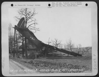 Consolidated > Glider Reclamation -- Battered (G-4A) Glider Shown Somewhere In Germany, Is Mute Evidence Of The Less Fortunate Landings During The Rees-Wesel Airborne Invasion.  Two Weeks Time Was All That The Engineers Of The 82Nd Service Group, 9Th Troop Carrier Comma