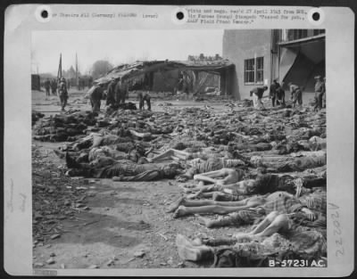 Consolidated > Hundreds Of Slave Workers Were Systematically Starved To Death At A Labor Camp Near Nordhausen, Germany.  A 9Th A.F. Cameraman, Accompanying Advanced Elements Of U.S. Armor And Infantry, Photographed This Section Of The Camp As German Civilians In The Bac