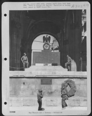Consolidated > Munich, Birthplace Of Nazi Party.  A Shrine Now Stands At The Scene Of The Hilter Putsch In 1923.  Pfc. Robert Beverly, Of North Garden, Va., Takes A Picture Of Sgt. Charles Walsh, Jersey City, Nj.  Above, Left To Right: Pfc. Walter T. Thrasher, Hughes, A