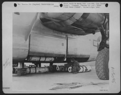 Thumbnail for Consolidated > Ground crew technicians of the Bombardment Group, commanded by Col. Charles B. Westover of College Park, Ga., load up a Consolidated B-24 Liberator in England with supplies to be parachuted to British airborne troops fighting on the east bank of the