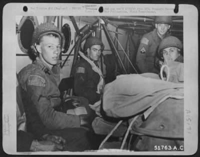 Consolidated > Infantrymen sitting in a CG-4A Glider awaiting take-off. They were dropped in France to reinforce shock troops dropped earlier by Troop Carrier Douglas C-47s.