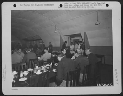 Consolidated > Officers Of The 401St Bomb Group Enjoy A Well-Prepared Meal In The Dining Room Of The Officers' Club At An 8Th Air Force Base Near Deenethorpe, England.  23 November 1944.