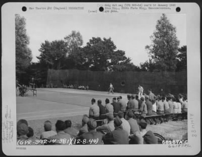 Thumbnail for Consolidated > Capt. Frank Shields And Sgt. Hare Clash In An Exhibition Tennis Match To Help Boost War Bond Drive, On The 381St Bomb Group Court At 8Th Air Force Station 167, England, 12 August 1944.