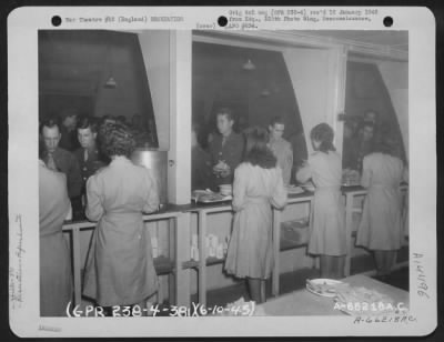 Thumbnail for Consolidated > Gis Of The 381St Bomb Group Are Served Refreshments At The Aero Club Dance On 6 October 1943.  8Th Air Force Station 167, England.