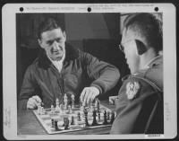 Lt. Colonel Francis S. Gabreski And 1St Lt. Oscar E. Collins, A Special Service Officer Of The 9Th Air Force And Former Basketball Coach Of Colonel Gabreski, Engage In A Friendly Game Of Chess And Talk Over Old Times.  England, 4 July 1944. - Page 1