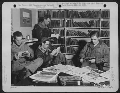 Consolidated > Relaxation And Good Books Are Enjoyed By Men At The Special Services Library At The 91St Bomb Group Base In Bassingbourne, England.