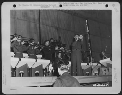 Consolidated > Major Glenn Miller And His Famous Band Entertain Air Force Men During His Visit To Steeple Morden, Cambridgeshire, England On 12 August 1944.