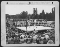 Billy Conn, A Noted Boxing Personality, Puts On An Exhibition Match For Men Of The 386Th Bomb Group At Great Dunmow, Essex, England On 2 August 1944. - Page 1