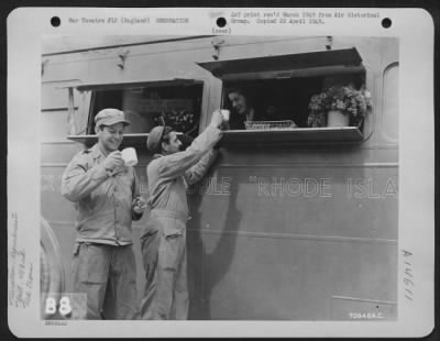 Thumbnail for Consolidated > Gis Of The 453Rd Bomb Group Are Served Coffee And Dougnuts At A Clubmobile By A Charming Red Cross Worker At An 8Th Air Force Base In England.