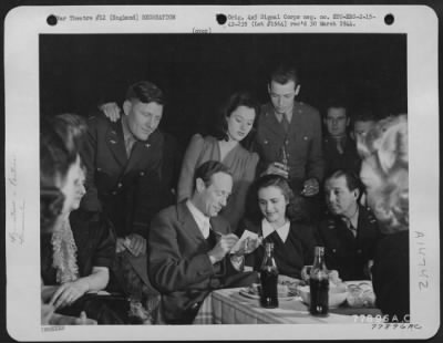 Thumbnail for Consolidated > Leslie Howard, Guest Of Honor Of The 8Th Air Force Party At Watford, England, Busy Giving Autographs To American Soldiers And English Girls.  15 February 1943.