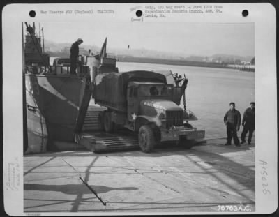 Thumbnail for Consolidated > Members Of The 834Th Engineer Aviation Battalion Load Equipment Aboard A Landing Craft During Amphibious Training At Torquay, England.