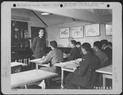 Consolidated > Instructor Cpl. F.J.G. Nunn Of Woolwich, London, England On Loan From The Raf, Instructs Allied Airmen On The Hydraulic System Of A Lancaster Bomber.  This Lecture Was Part Of The Instruction Organized By Manufacturers To Teach Airmen How To Handle Their