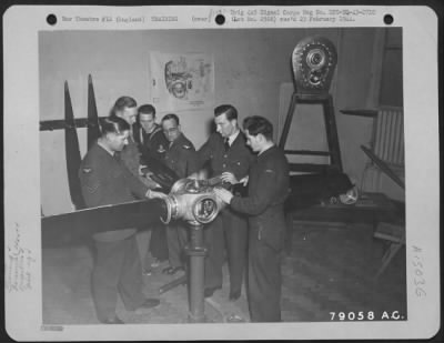 Consolidated > Members Of The Allied Air Forces Assemble A 4-Bladed Variable Pitch Propeller At The Rotal Gyroscope Co. At Gloucester, England, One Of The Manufacturers' Schools Set Up To Insure That Their Products Are Handled And Maintained With Maximum Efficiency.  Th