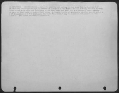 Consolidated > Re-Deployment -- Fighter Planes - After Dissasembly And Taping, The Now Dingy Looking Republic P-47 Thunderbolts Are Hauled Through The Streets Of Liverpool To The Docks.  This Is A Touchy Business For Many Spots On The 8 Mile Trip From Speke To The Docks