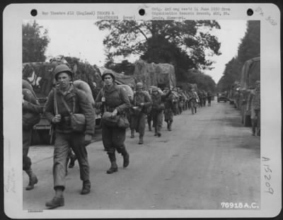 Consolidated > Men Of The 10Th Air Depot Group Leave The Marshalling Area, South England, For The Port Of Embarkation.  7 July 1944.