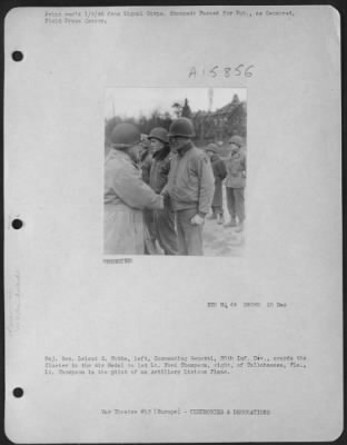 General > Major General Leland S. Hobbs, Left, Commanding General 30Th Inf. Div., Awards The Cluster To The Air Medal To 1St Ford Thompson, Right, Of Tallahassee, Fla.  Lt. Thompson Is The Pilot Of An Artillery Liaison Plane.