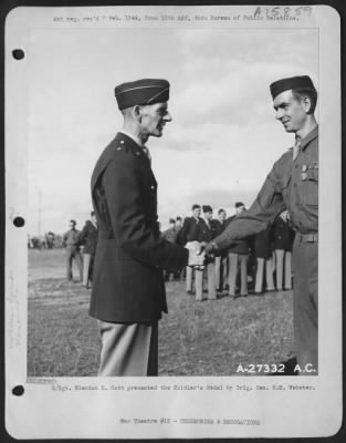 General > S/Sgt. Glendon E. Catt, 23, Lake Odessa, Mich. And Lakeland, Fla., bombardiers-navigator of an AAF Martin B-26 Marauder, was presented the Soldier's Medal by Brig. Gen. Robert M. Webster at a decoration ceremony at 12th AAF bomber base Jan 9.