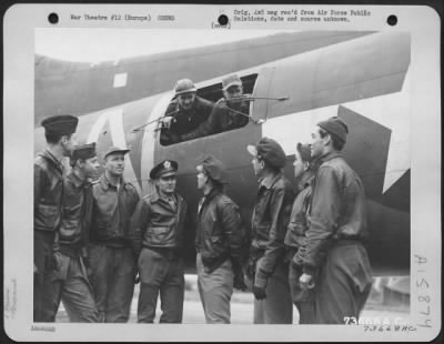 General > Crew Members Of A Boeing B-17 "Flying Fortress" Discuss The Hazardous Flight Home From A Mission Over Frankfurt, Germany During Which Both Engines Were Knocked Out By Enemy Flak.  Crew Members Are: Sgt. David Cameron, Boothwin, Pa.; S/Sgt. Ruben Kisner, D