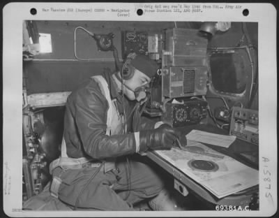 Thumbnail for General > The Navigator Of A 91St Bomb Group Boeing B-17 "Flying Fortress" Charts The Course Of His Plane Enroute To Bomb Enemy Installations Somewhere In Europe On 5 November 1943.