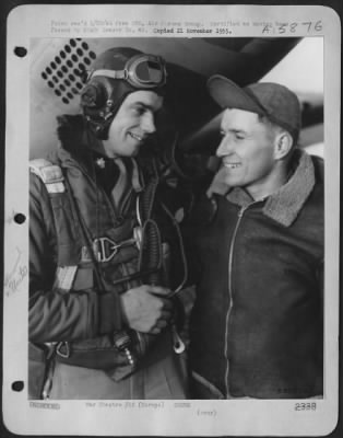 General > Europe - North American P-51 Mustang Pilot Major Clarence E. Anderson, Jr., Of The 357Th Fighter Group, Congratulates His Crew Chief, Sgt. Leon E. Zimmermann For His Part In The Team Work That Has Made Possible Anderson'S Amazing Total Of 480 Operational