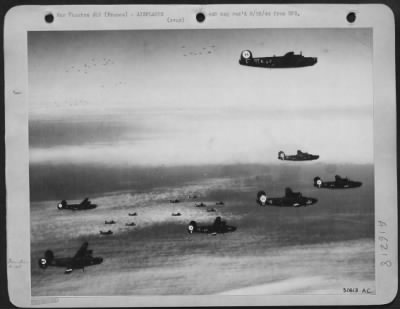 Thumbnail for Consolidated > LIBS ON THEIR WAY--The German aircraft assembly plant and transport base at Bourges, southeast of Orleans, was one of the targets for U.S. Consolidated B-24 Liberators, shown here in formation near the target on 10 April 44.