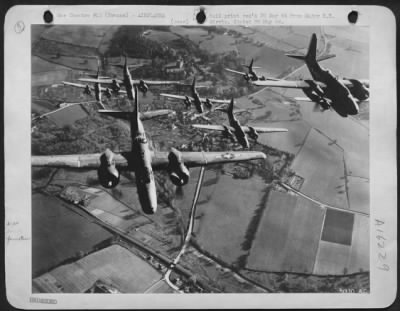 Douglas > Flying low Douglas A-20 Havocs, light bombers of the 9th AF wing their way to the target somewhere in Nazi-held France. Note motor vehicle in center of highway. (Lower center).