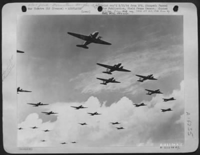 Douglas > Into the clouds go these Douglas C-47's of the Troop Carrier Air Division of the 12th Air force laden with tough and well trained paratroopers reday to hit the enemy behind the lines in Southern France.